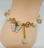 beaded bracelet with butterfly charm 