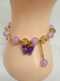 beaded bracelet with butterfly charm 