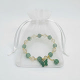 beaded bracelet with butterfly charm 