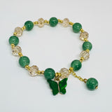 beaded bracelet with butterfly charm 