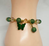 beaded bracelet with butterfly charm 