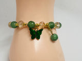 beaded bracelet with butterfly charm 