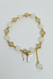 beaded bracelet with butterfly charm 