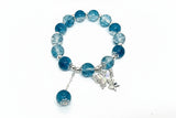 beaded bracelet with butterfly charm 