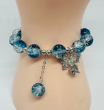 beaded bracelet with butterfly charm 