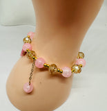 pink beaded bracelet with butterfly uk