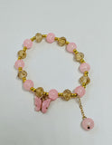 pink beaded bracelet with butterfly uk