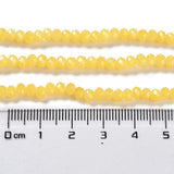 Imitation Yellow Jade Beads 4mm x 3mm Faceted Rondelle Reach Compliant