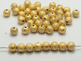 gold glitter beads